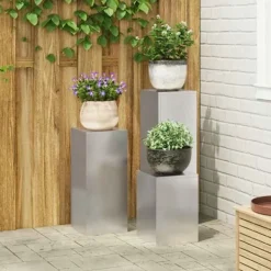 Outlet Sæt af 3 stilfulde planteholdere i rustfrit stål | Størrelse: 24x24x75 cm | Farve: Sølv Krukker & Plantebeholdere